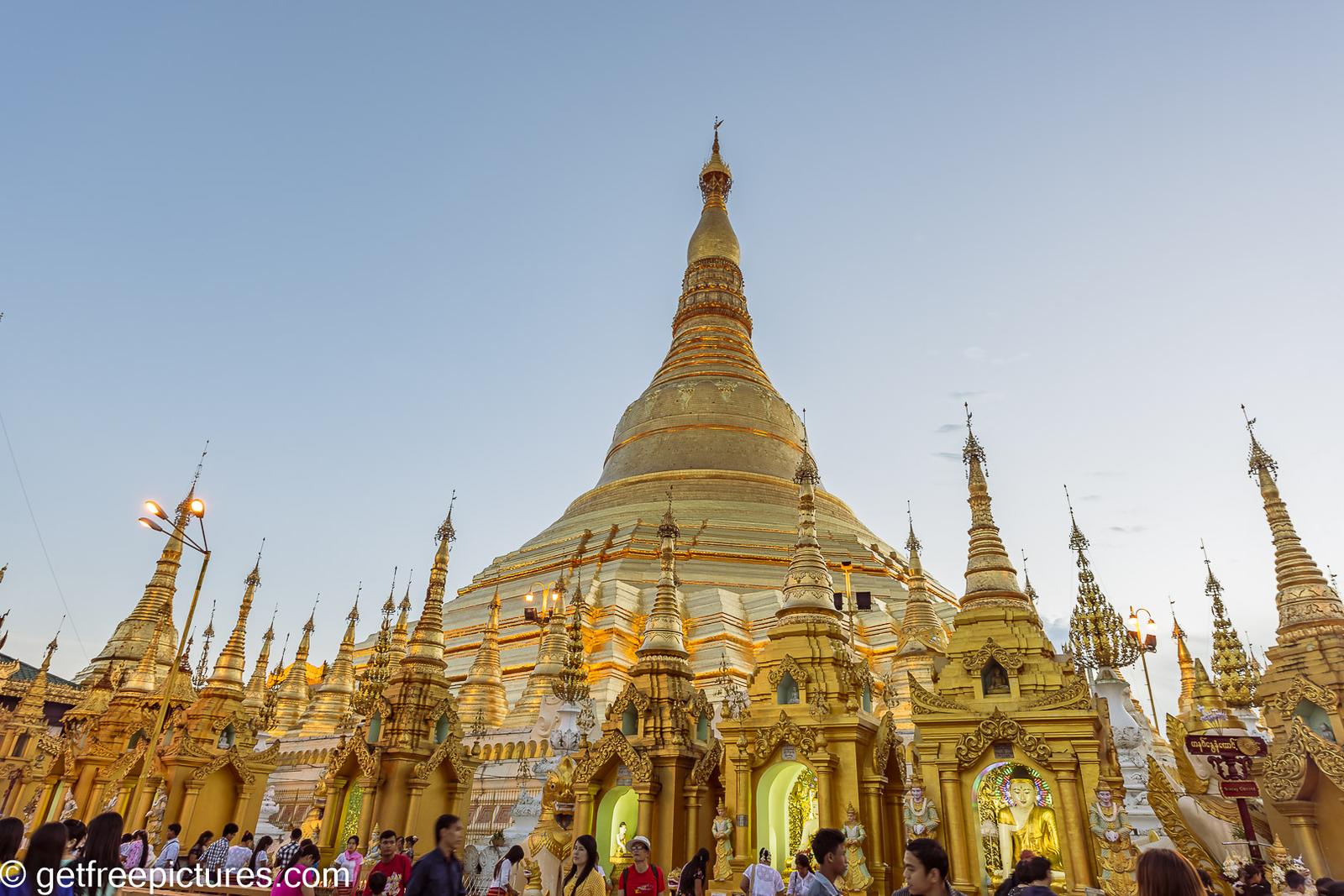 Shwedagon Pagoda's golden stupa surrounded by smaller shrines